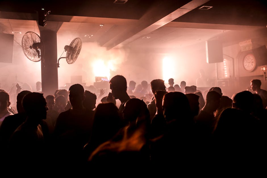 Community members raising signs during a public action.